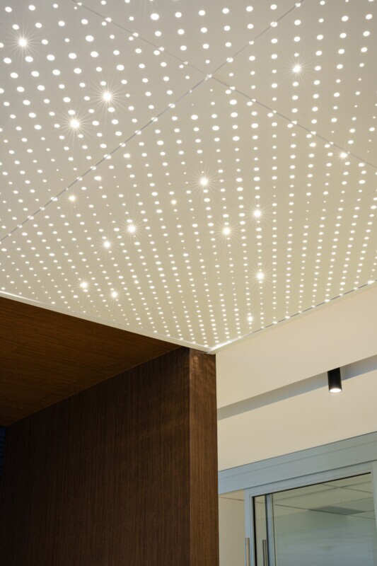 Cresa office featuring a bright, uniform Agilis backlit ceiling installation.