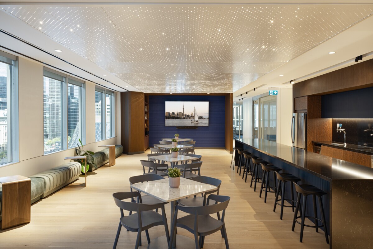 Modern Cresa office environment featuring high-performance Agilis backlit ceiling panels.