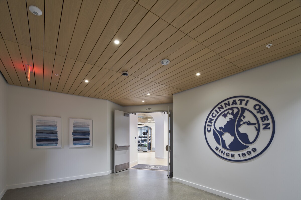 LINE:form linear plank ceilings in the Lindner Family Tennis Center's Suites area and performance center