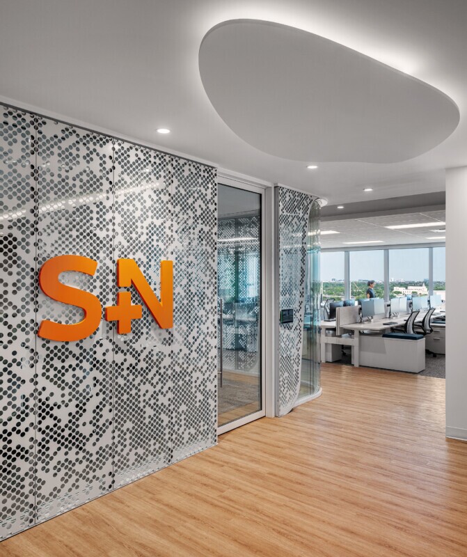 Smith Nephew's office space with PANEL:form design perforated ceiling panels
