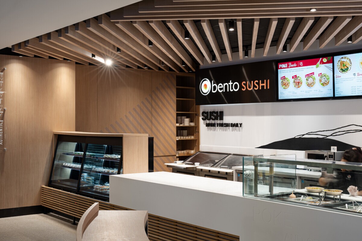 Perspective view of the Agilis traditional wood-look baffle system at Bento Sushi.