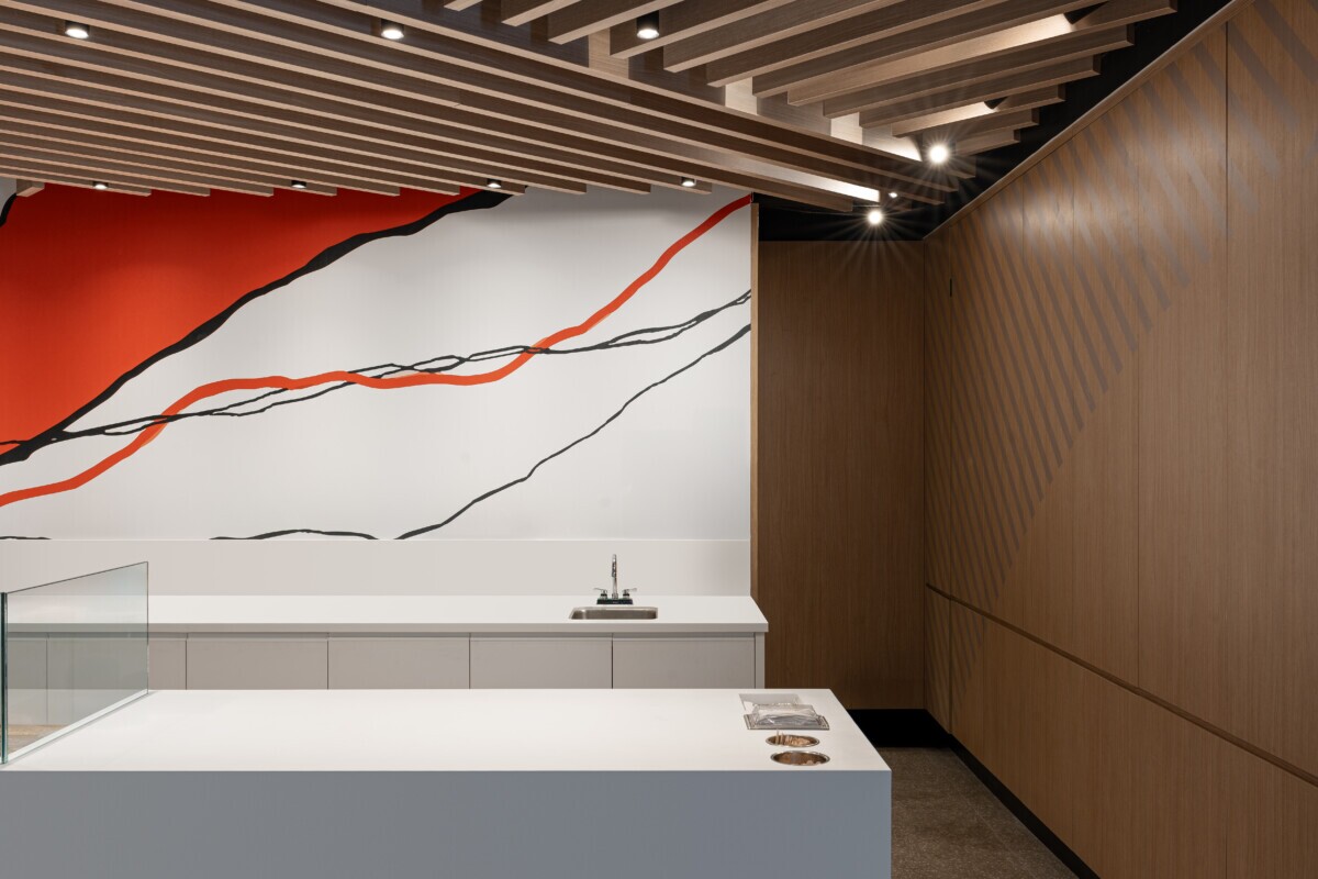 Warm wood-look Agilis traditional baffles overhead in the Bento Sushi restaurant.