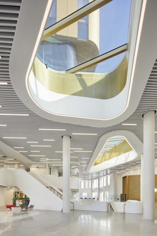 Vertical view of Agilis perforated baffle ceiling highlights modern architecture at York University.