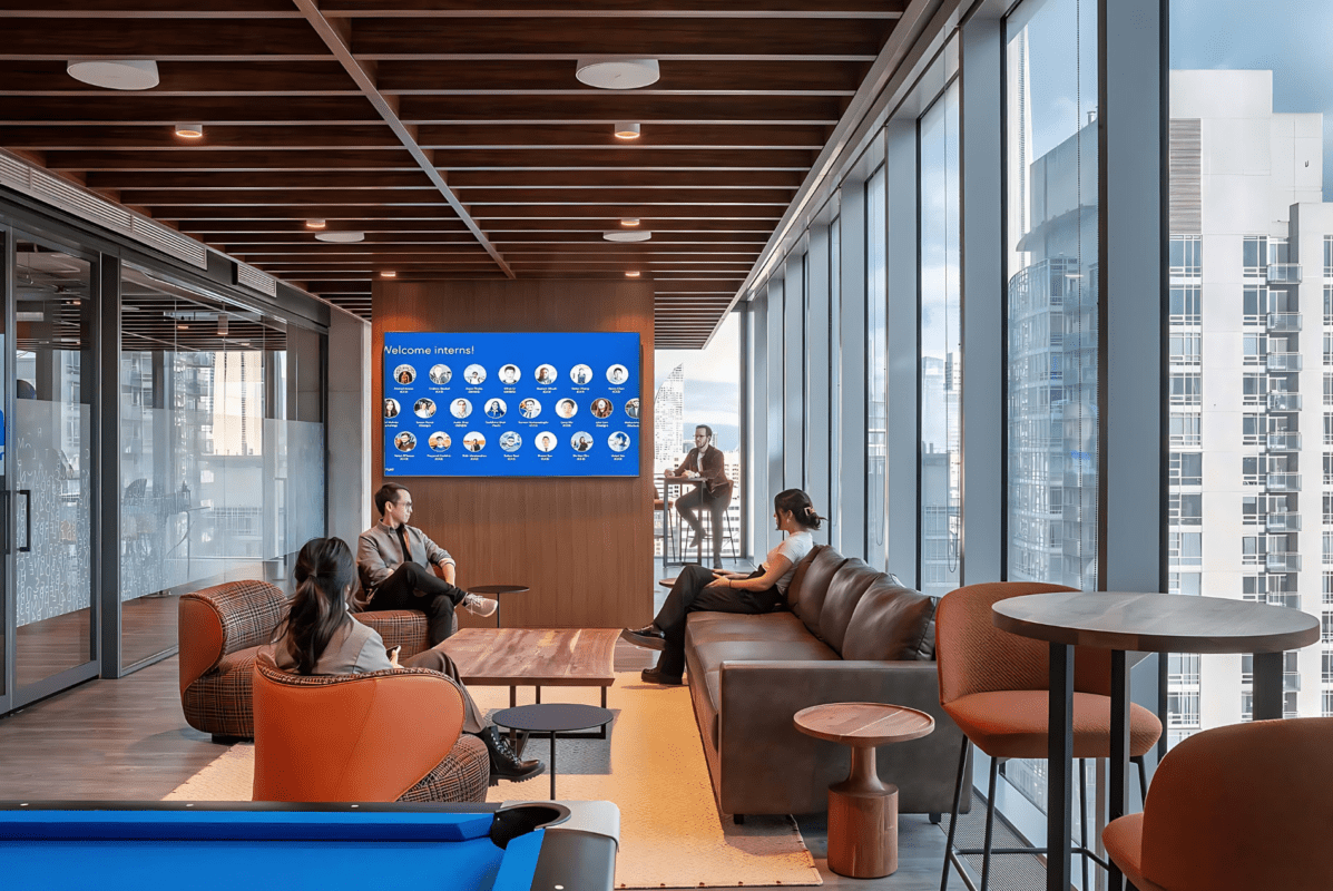 Intuit collaboration area showcasing a woodgrain baffle ceiling.