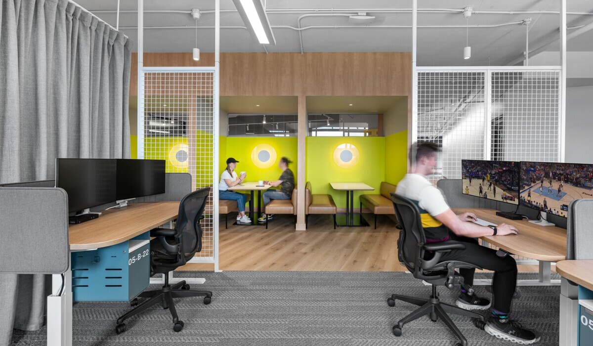 theScore Toronto office featuring Silentia quiet wall acoustic baffles behind a private meeting booth.