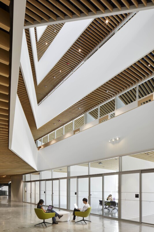UBC, School of Biomedical Engineering in Vancouver, Canada features Maxxit’s custom LINE:Form Traditional Baffles in wood throughout the interior of the university.
