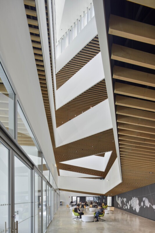 UBC, School of Biomedical Engineering in Vancouver, Canada features Maxxit’s custom LINE:Form Traditional Baffles in wood throughout the interior of the university.