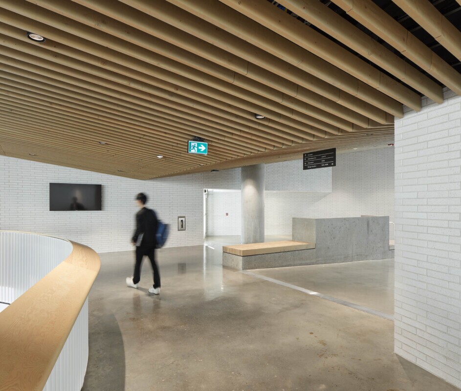 Interior hallway of the UBC, School of Biomedical Engineering in Vancouver, Canada featuring Maxxit’s custom LINE:Form Traditional Baffles in wood throughout the interior of the university.