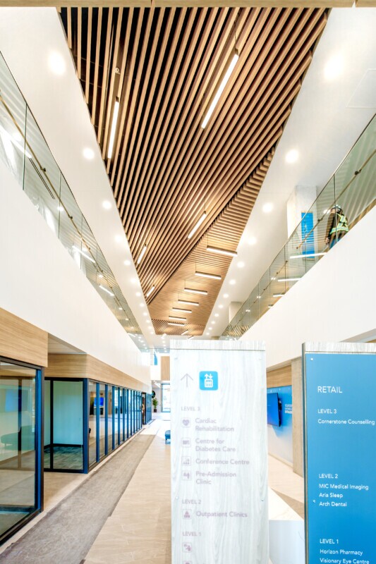 LINE:Form Traditional Baffles finished in Champagne Pine at Covenant Health Centre