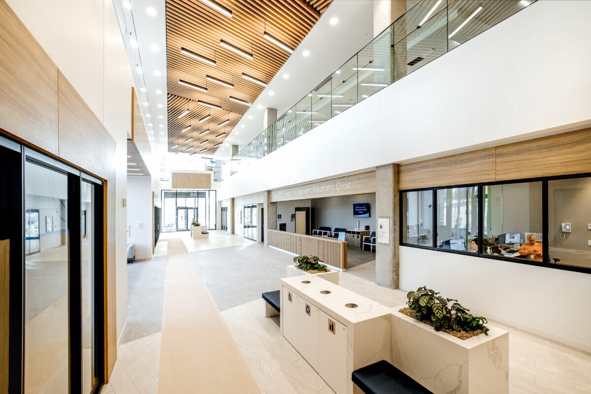Healthcare office space ceilings using Maxxit's LINE:Form Traditional Baffles finished in Champagne Pine at Covenant Health Centre in Canada