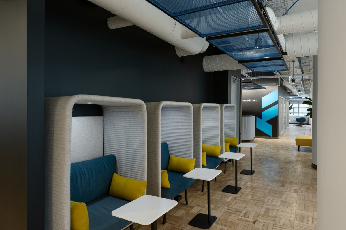 Hallway photo showing Maxxit's PANEL:Form Metal Ceiling Panels at Float Financial's offices in Toronto, Canada