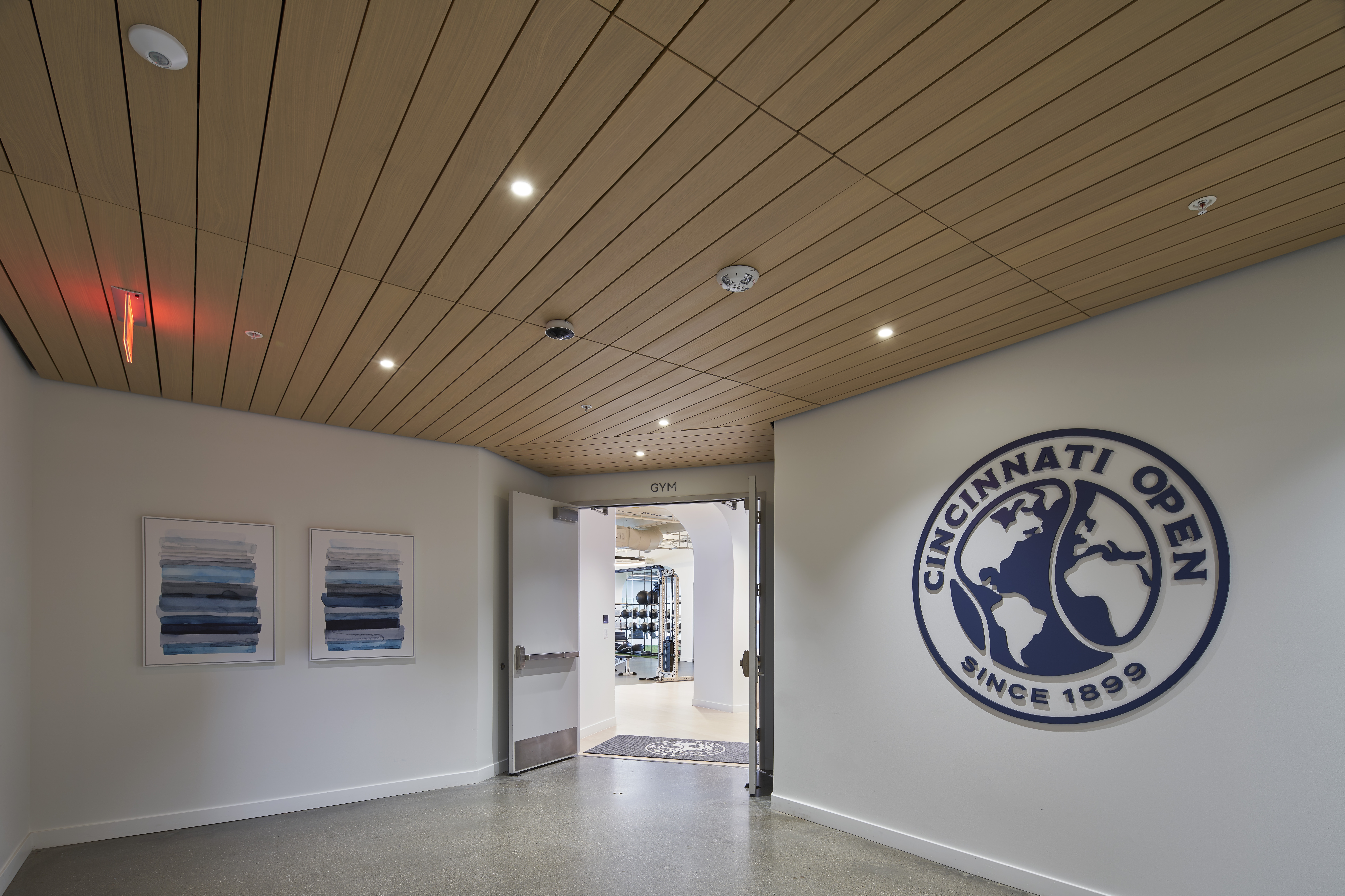 LINE:form linear plank ceilings in the Lindner Family Tennis Center's Suites area and performance center