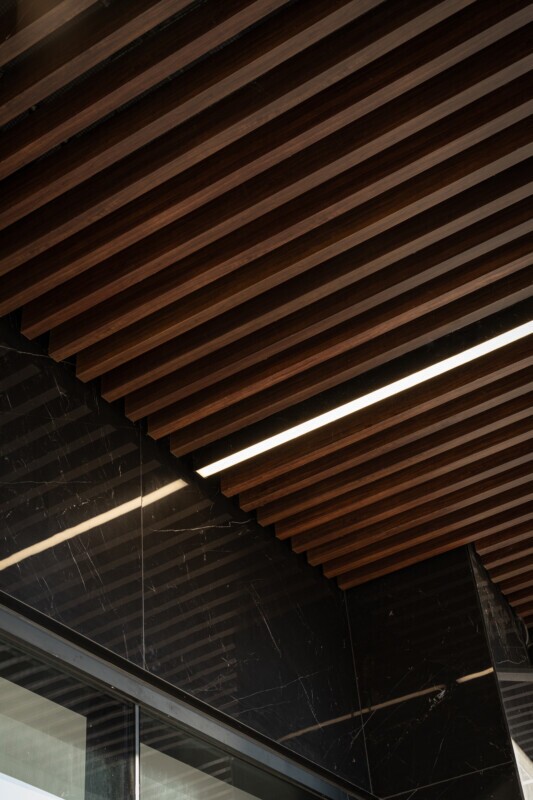 Close-up perspective of the Protero traditional baffle ceiling.
