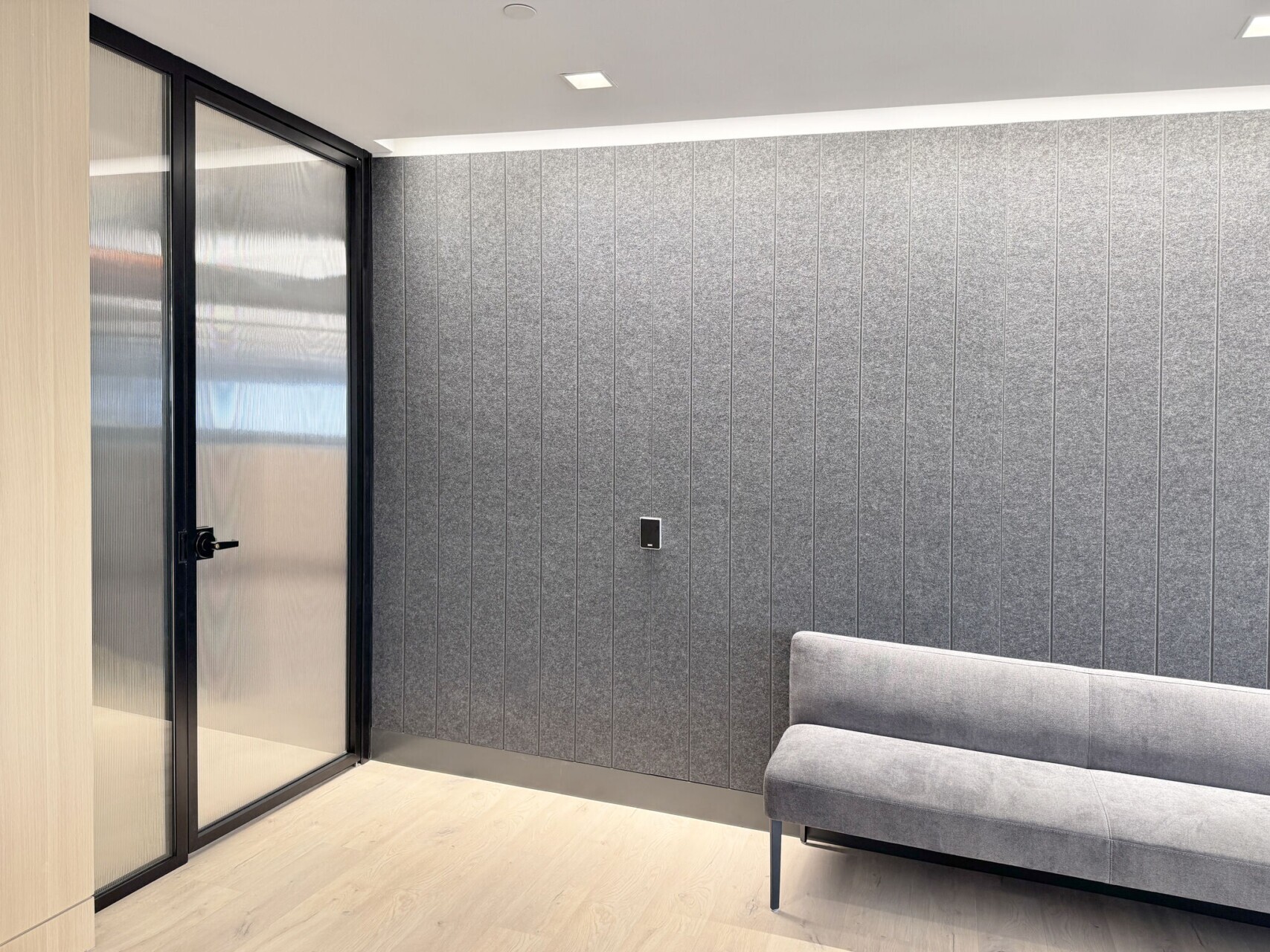 Edgepoint Wealth Management office waiting area with gray quiet wall.