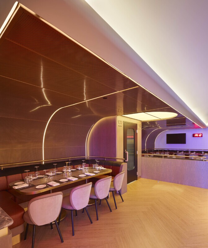 Modern dining area at Scotiabank Arena featuring Agilis custom perforated curved metal ceiling panels.