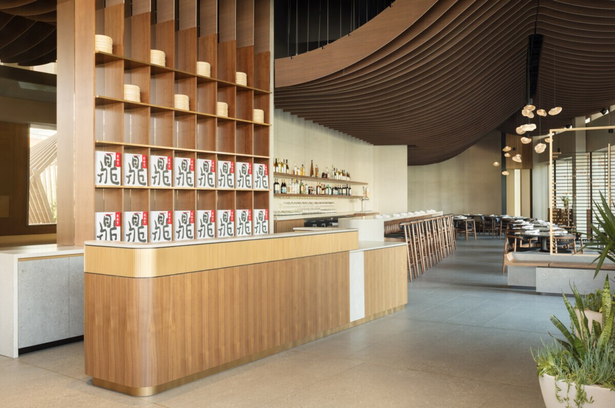 View of entranceinterior of Din Tai Fung dining room in Santa Monica, California. Showcasing Maxxit's wave ceiling.