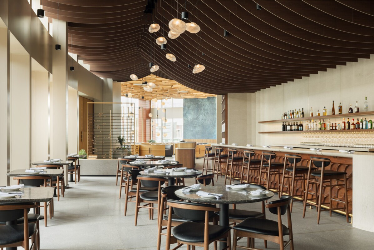 View of the interior of Din Tai Fung dining room in Santa Monica, California. Showcasing Maxxit's wave ceiling.