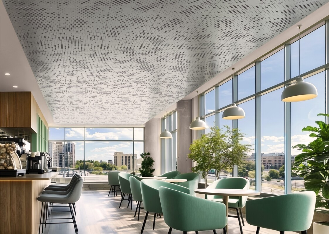 Modern office lounge with perforated ceiling panels.