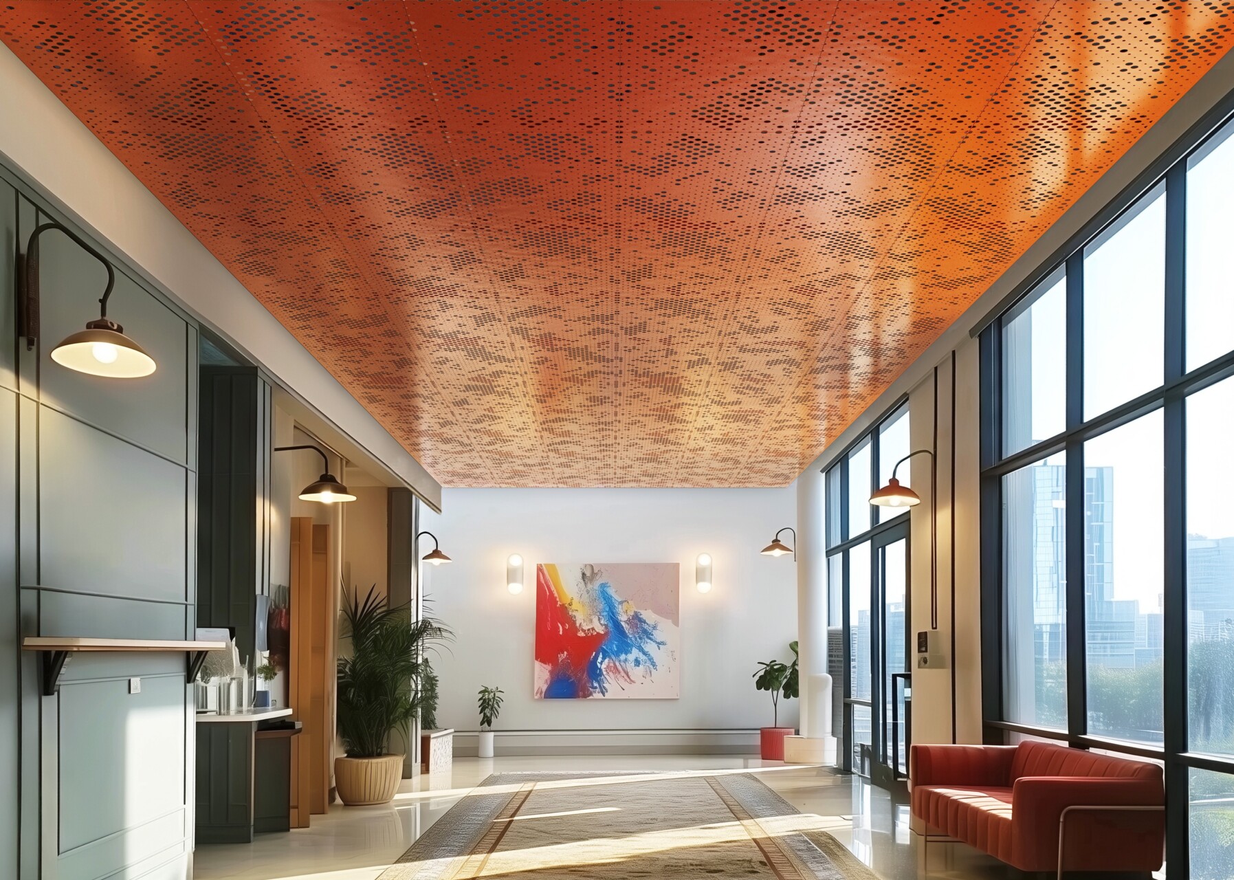 Modern lobby with orange perforated ceiling panels, large windows, abstract art, and contemporary furniture.